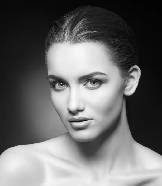 elegant-woman-portrait-on-dark-background-in-black-2026-01-11-09-09-44-utc